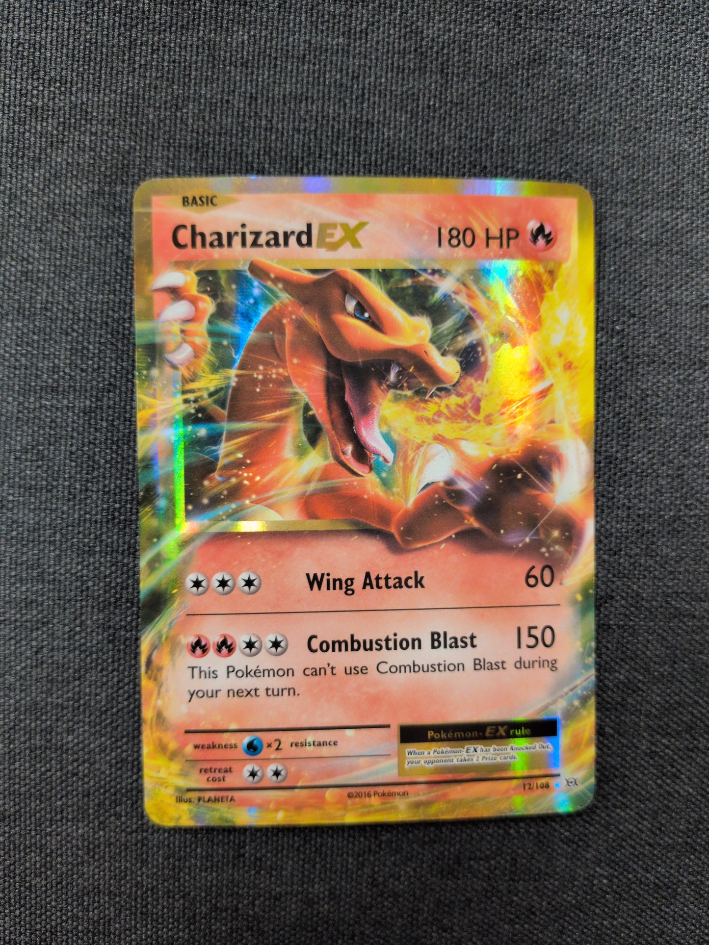(EVO) Charizard EX #12 NM