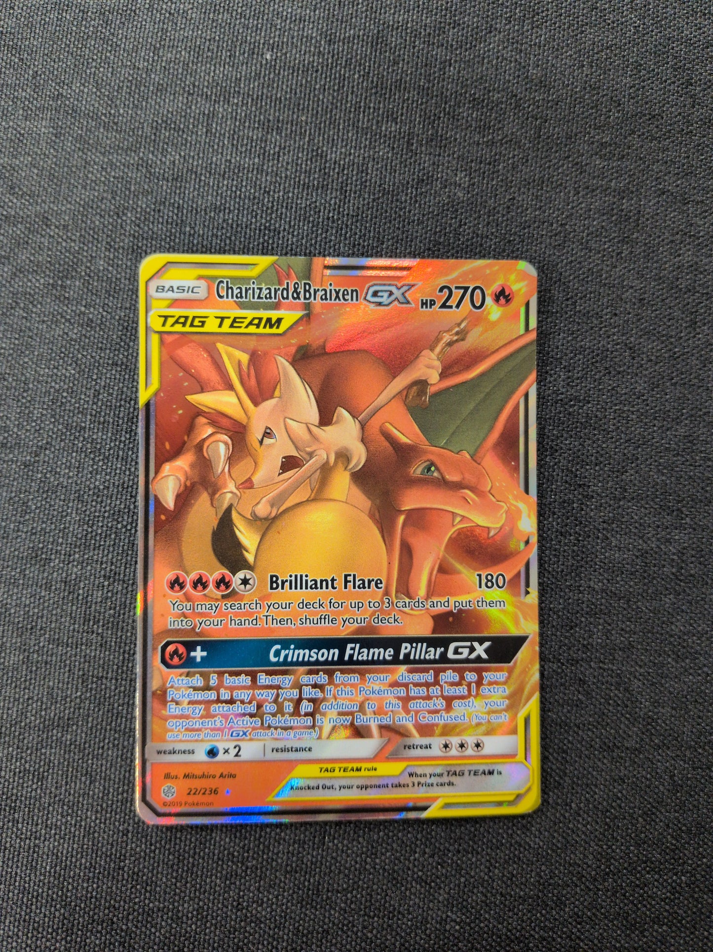 (SM12) Charizard & Braixen GX #22 HP